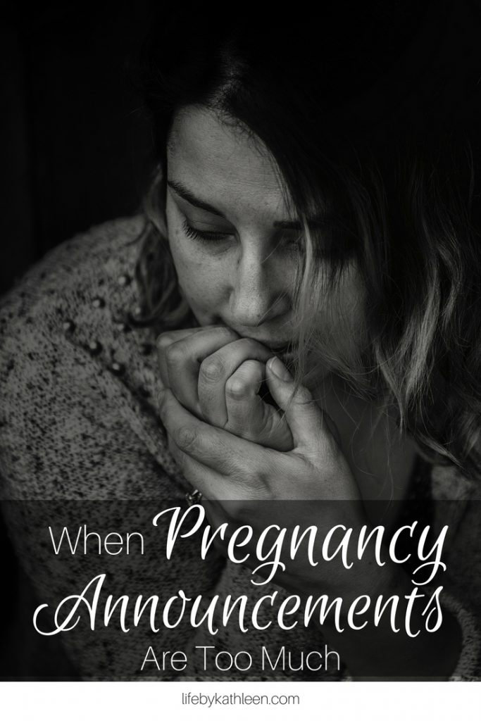black and white female biting nails. text overlay: when pregnancy announcements are too much